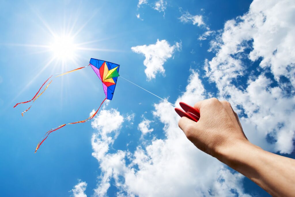 flying a kite in the sky 